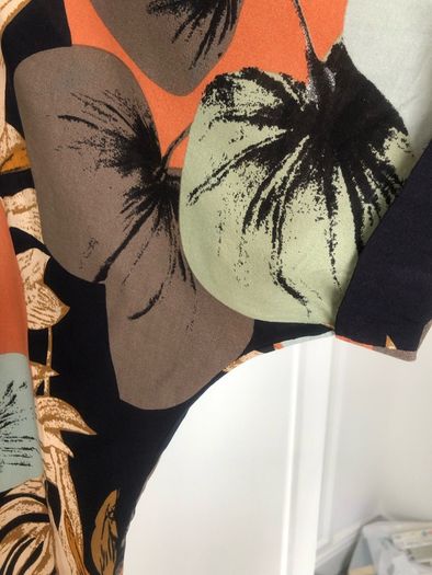 Oversized floaty top