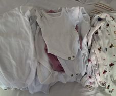 newborn vest and sleepsuits bundle