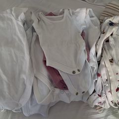 newborn vest and sleepsuits bundle