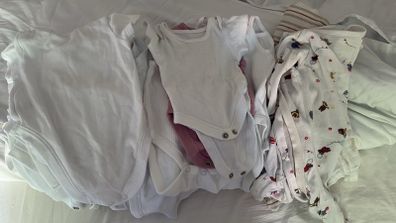 newborn vest and sleepsuits bundle