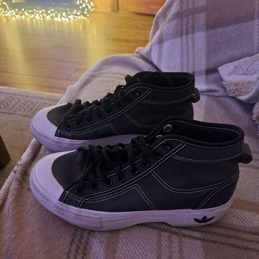 Black and white Adidas Nizza trek trainers