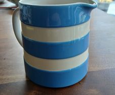 TG Green Cornishware Dreadnought Jug, featuring the iconic blue and white stripes.
