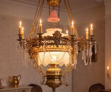 The is a very large old  brass coolie lamp.
