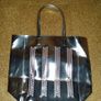 Estee Lauder gold bag Image 4