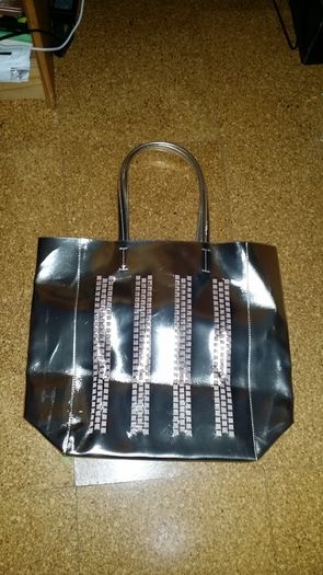 Estee Lauder gold bag