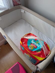 Chicco next2me crib for babies + Pampers size 4 diapers