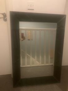 Heavy large black glass mirror