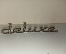 Classic Car " DELUXE " CAR BADGE, Good condition with 2 mounting pins vintage