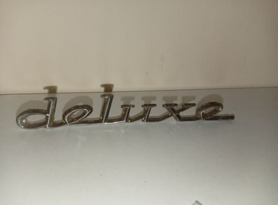 Classic Car " DELUXE " CAR BADGE, Good condition with 2 mounting pins vintage