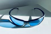 Vintage Arnette Titan 4006 sunglasses with blue lenses and sporty wraparound design