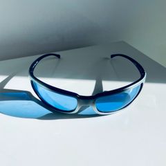 Vintage Arnette Titan 4006 sunglasses with blue lenses and sporty wraparound design
