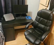 Desk with leather office chair
