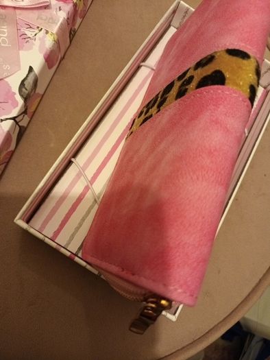 Pink wallet in gift box
