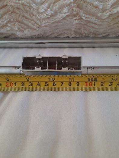 Wall mounted towel rack