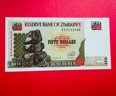 Zimbabwe  50  Dollars  1994. Verified Under Uv Light.  ( Uncirculated )