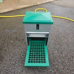 Feed-O-Matic chicken feeder