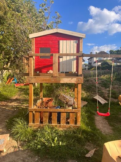 Play house with slide and climbing wall