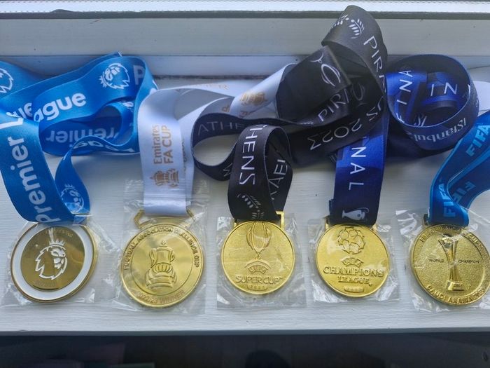 Collection of Brand new Man City Winners Medals