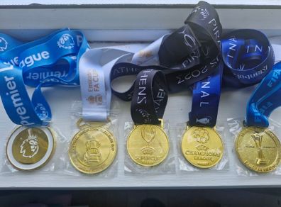 Collection of Brand new Man City Winners Medals