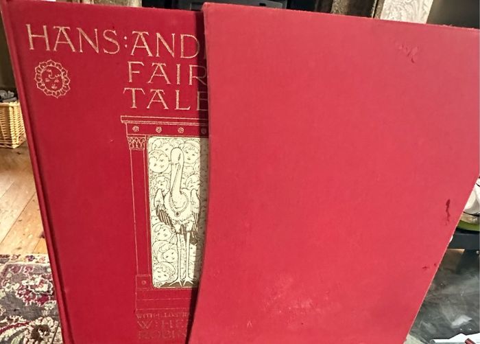 Delve into the enchanting world of Hans Christian Andersen with "Hans Anderson's Fairy Tales" presented by The Folio Society in 2001. This hardcover edition, graced with the whimsical illustrations of W. Heath Robinson, offers a timeless collection that t