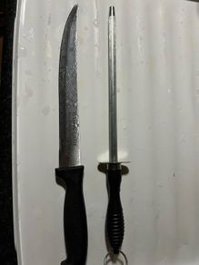 Kitchen knife and steal for sharpening knives