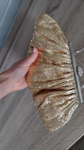 Gold sequin with rinstones clutch