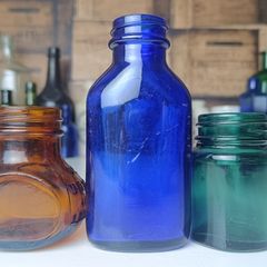 458 - Set of Three Beautiful Vintage Glass Decorative Collectible Bottles - Amber Eire Bovril, Cobalt Blue Magnesia and Turquoise Science Cream