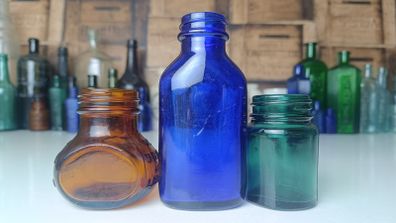 458 - Set of Three Beautiful Vintage Glass Decorative Collectible Bottles - Amber Eire Bovril, Cobalt Blue Magnesia and Turquoise Science Cream