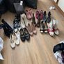 slection of clothes footwear and a tv. Image 3