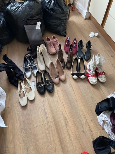 slection of clothes footwear and a tv.