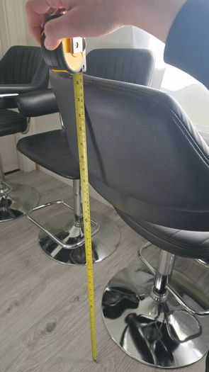 Adjustable black faux leather swivel bar stool with a metal base x3