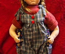 Collectable Porcelain collector doll with stand