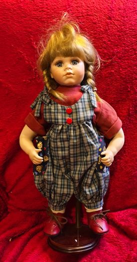 Collectable Porcelain collector doll with stand