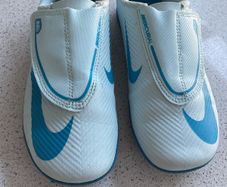 Blue Nike Astro Runners
