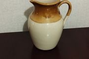 Vintage earthenware milk jug