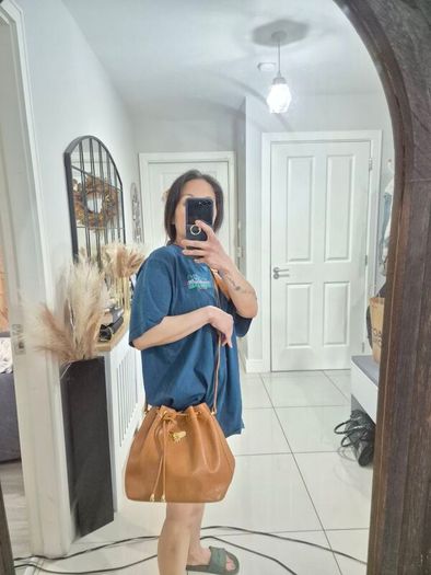 Nina Ricci pebbled leather bucket bag
