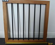 Oak and black metal stair gate