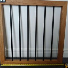 Oak and black metal stair gate