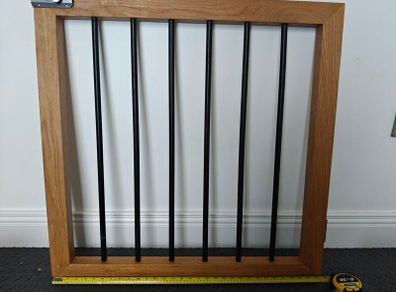 Oak and black metal stair gate