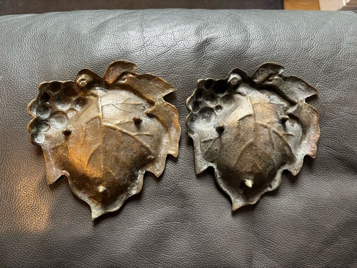 A pair of vintage solid brass grape leaf trinket dishes/ ashtrays