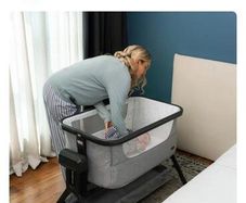 Baby bed side electric crib for sale