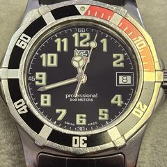 Tag Heuer Professional WM1212 (Womens - Black/Red Dial)