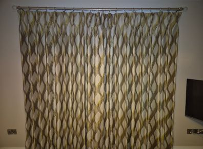 Curtains including curtain pole and wall fixings