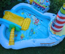 kids paddling pool, with pinhole puncture