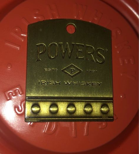 Powers whiskey medal