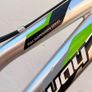 Rockway mountain bike silver and black frame with green accents and a full suspension system. Image 6