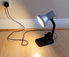 Compact size student table lamp with integrated desk organiser
