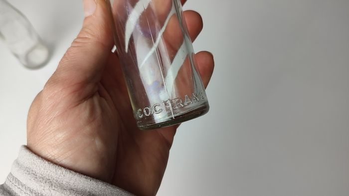 385 - Set of 2 Vintage Collectible Decorative Clear Glass Cantrell and Cochrane Mineral Bottles