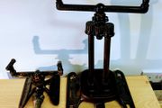 Two vintage rain king cast iron sprinklers
