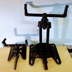 Two vintage rain king cast iron sprinklers